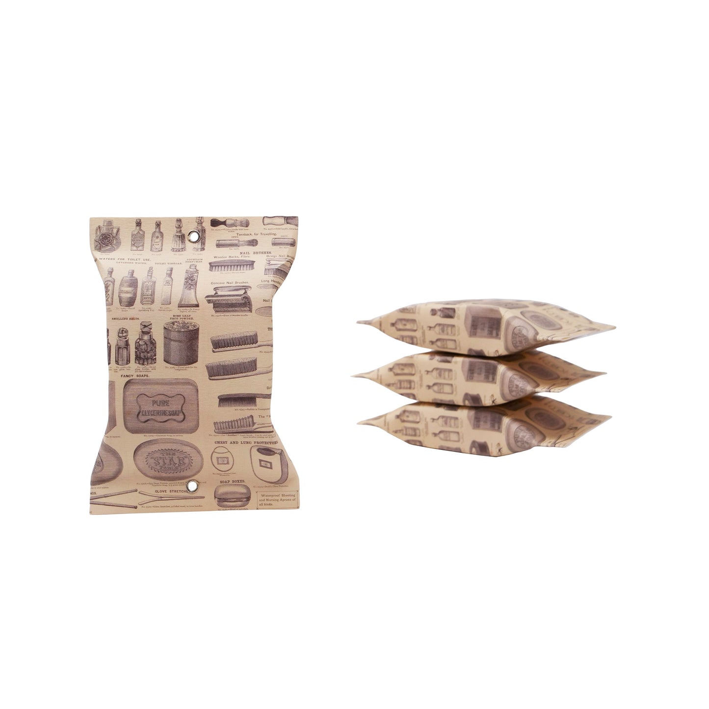 Four soaps on a white background. On the left there is a standing soap and on the right there are three soaps pilled up on top of each other.