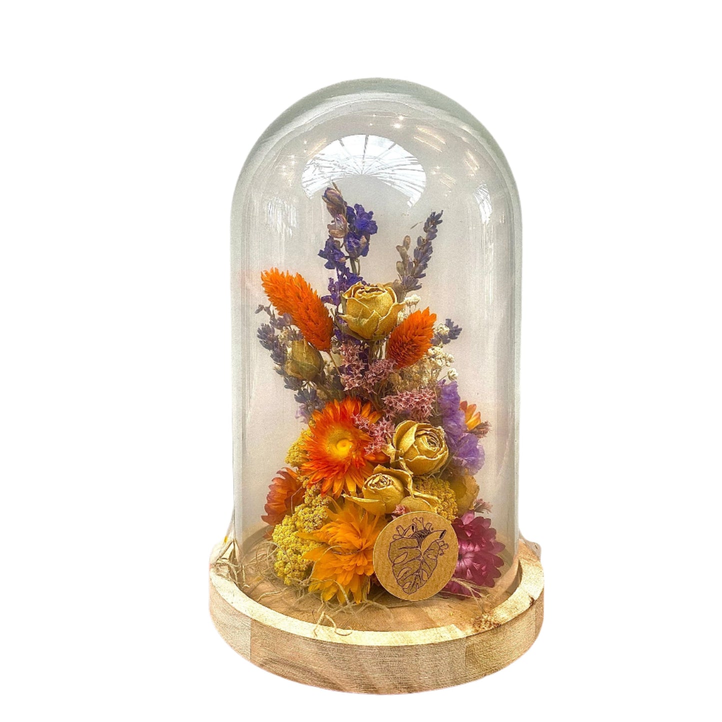 A jar with dried flowers in colours orange, purple, yellow and green.