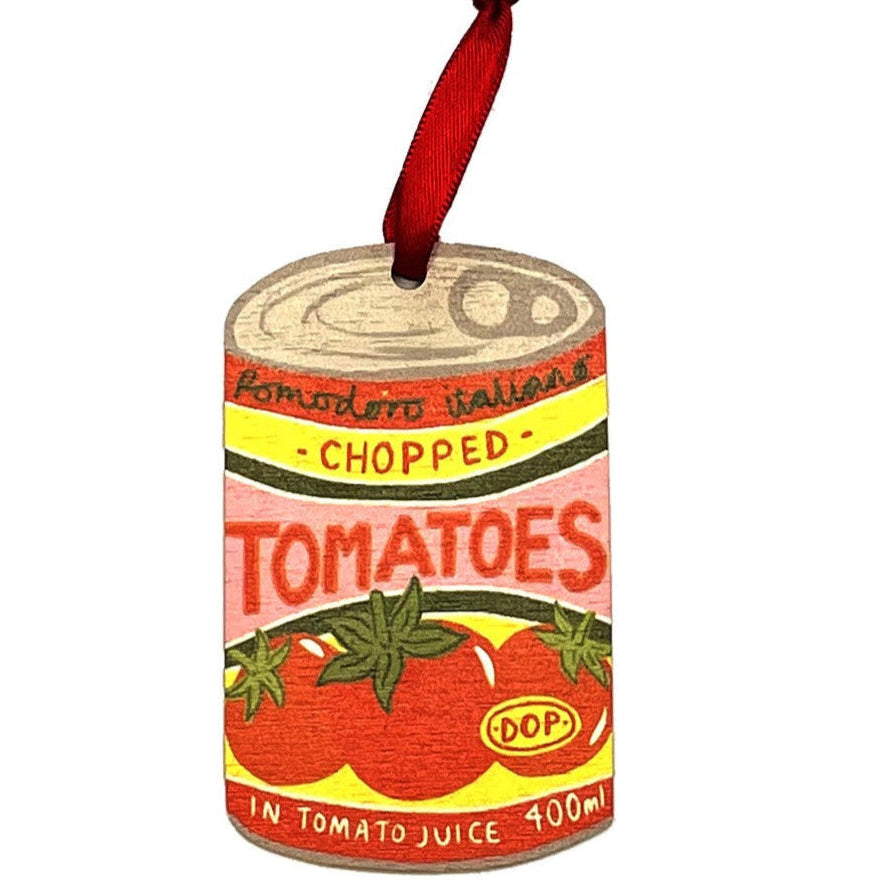 Decorative ornament shaped like a can of chopped tomatoes with a red ribbon.