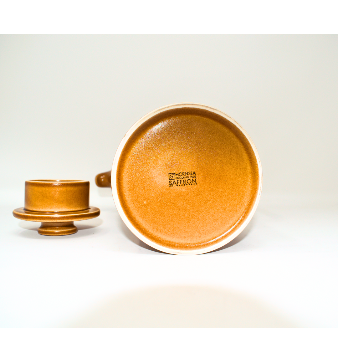 Ceramic dish with a logo on a white background