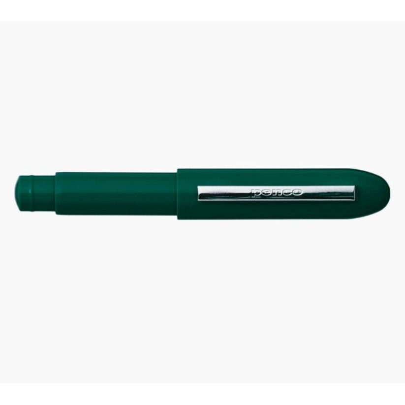 Green pencil with silver clip on a white background