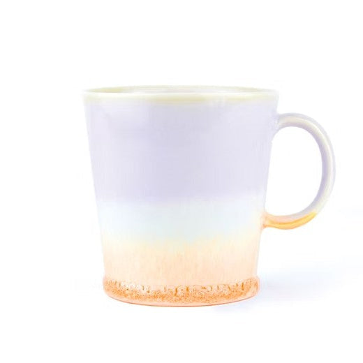 Mug with gradient design from white to orange on a white background