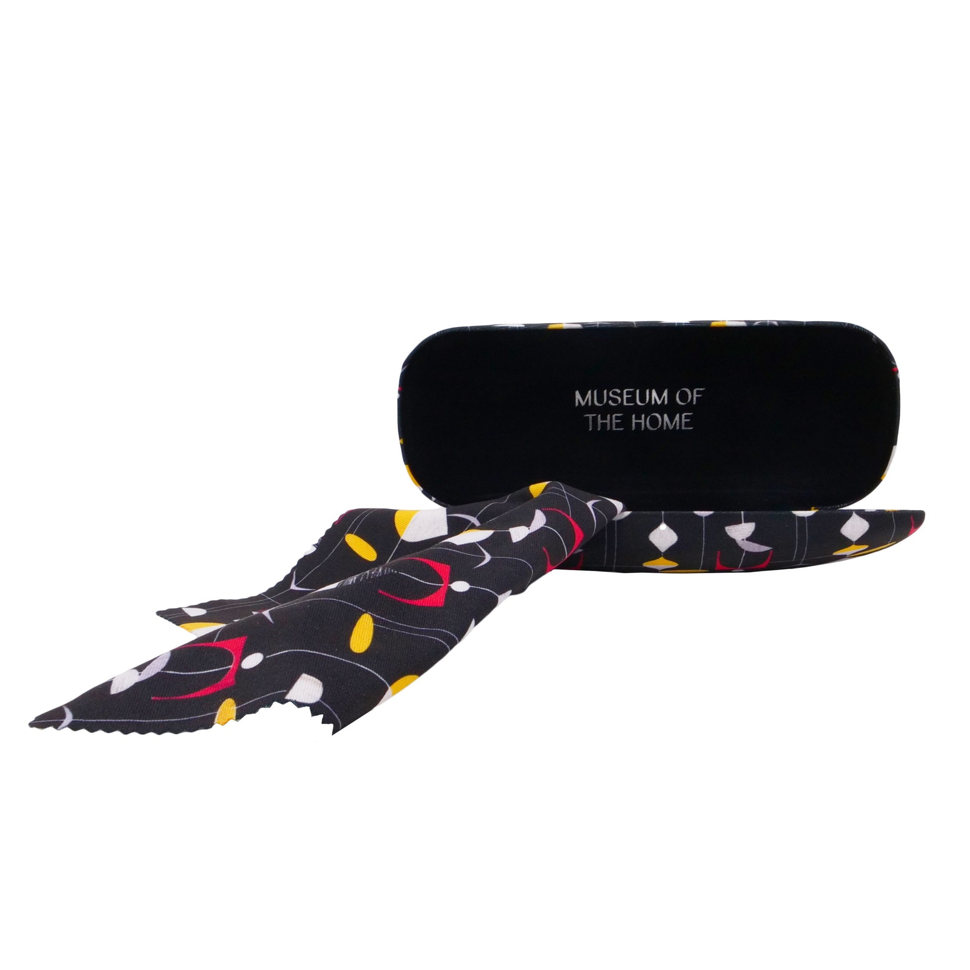 Glasses case open with museum of the Home logo showing. Cloth is outside of the case and has the same mobile design.