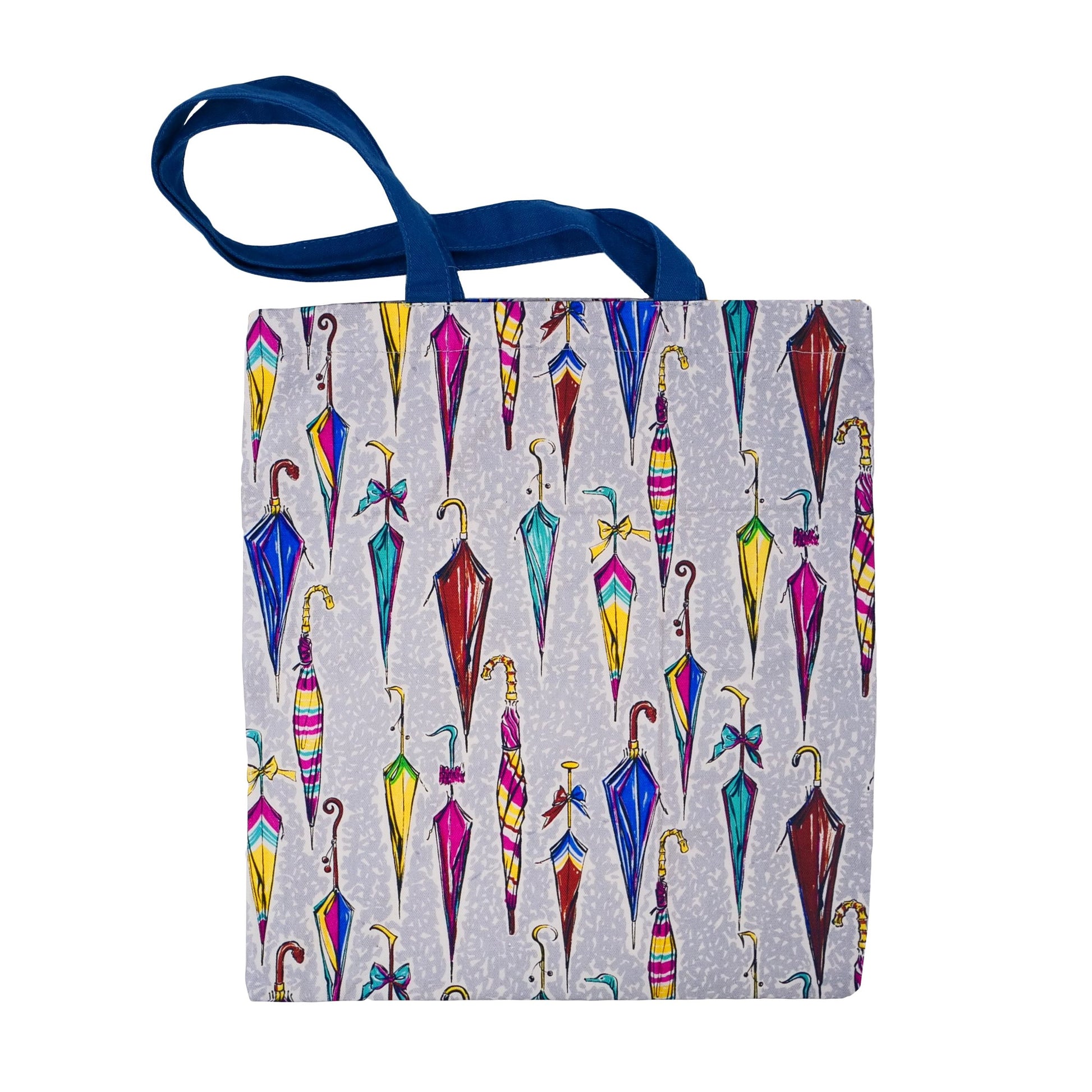 Tote bag with navy blue straps and a grey and white mottled background with various umbrella illustrations in mainly pink, red, blue and yellow.