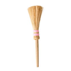 A small broom with pink details.