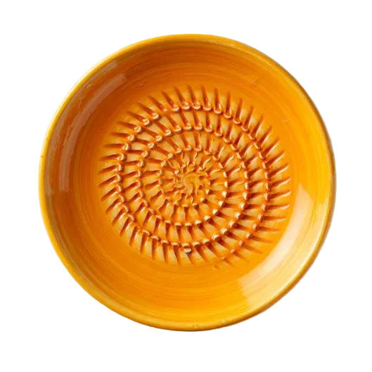 A top-down view of a round ceramic bowl with a glossy, vibrant orange-yellow glaze and a textured spiral pattern inside, set against a light gray background.
