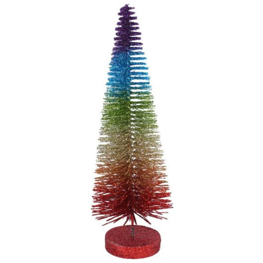 A small pine tree in rainbow colours with a red base on a white background.