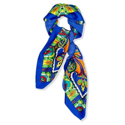A folded blue scarf with colourful details