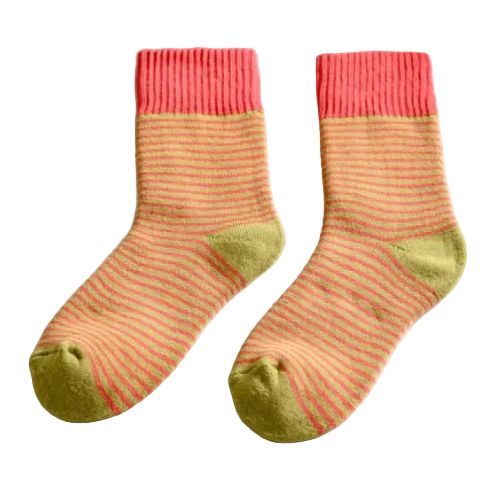 Pair of striped socks with pink, orange, and green colors on a light gray background