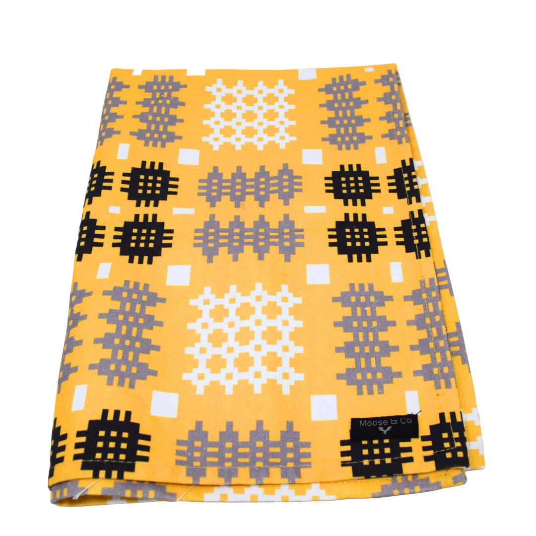 Folded fabric with geometric pattern on a white background