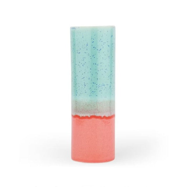 Tall cylindrical vase with two-tone design on a white background