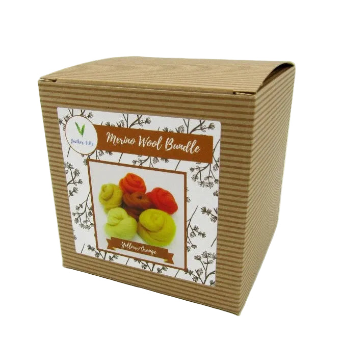 Box of merino wool bundles with a label on a white background
