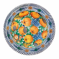 Tin plate with design featuring yellow fruit and white and blue detailing.