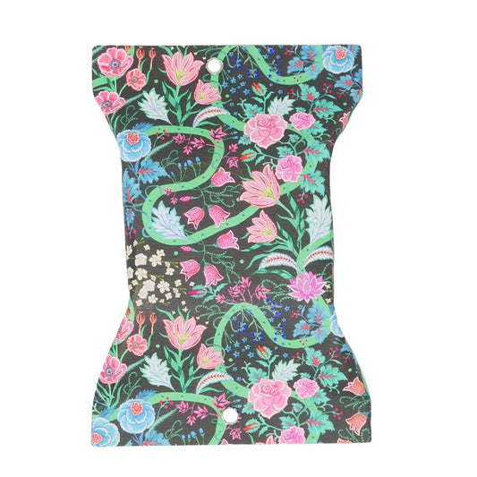 Packet of Geranium Rose Garden Soap with black background and pink, red and blue flowers with green stems and swirled lines.