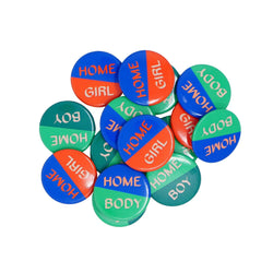 Three types of round badges, red and blue badge says Home girl. Light and dark green says Home boy. Blue and green says Home Body.