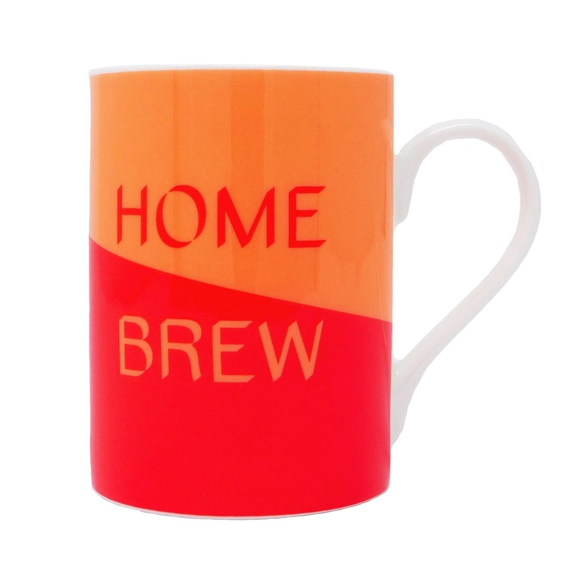 Mug with half orange and half red background separated diagonally, with words Home in red and Brew in orange. Also has white handle. 