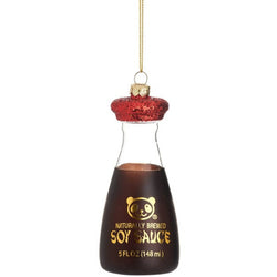 A bauble in the shape of a soy sauce bottle. It has got a red lid.