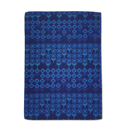 Tea towel with abstract verdure pattern in blue colourway. 